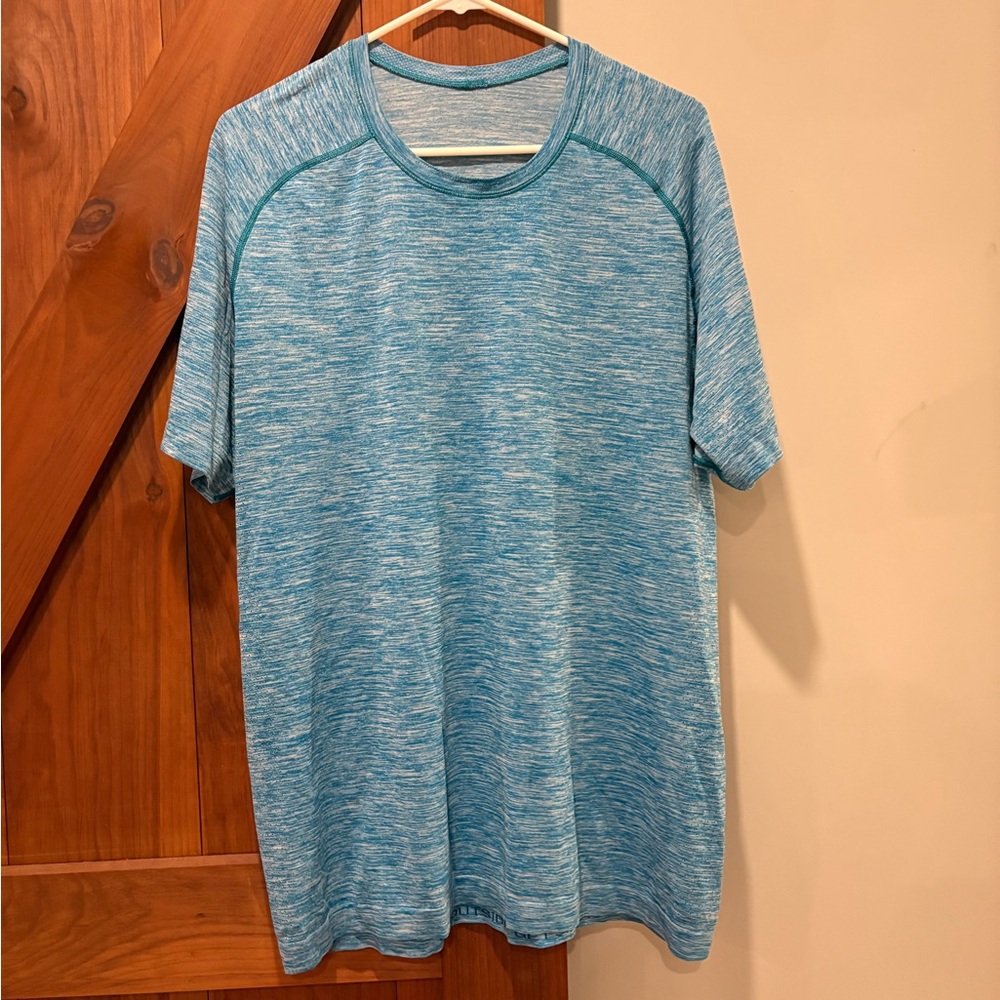 Heathered turquoise metal vent short sleeve shirt